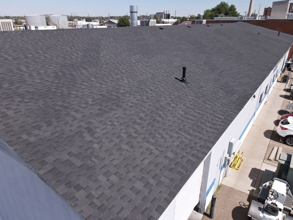 Commercial Re-roofing Project with IKO Cambridge Shingles in Pueblo image